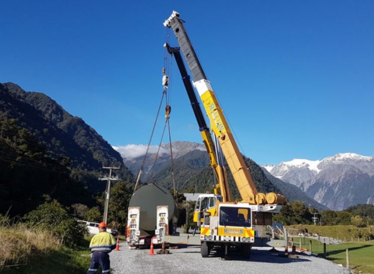 SuperVault lifted into position by crane at Franz Josef Heli Pad