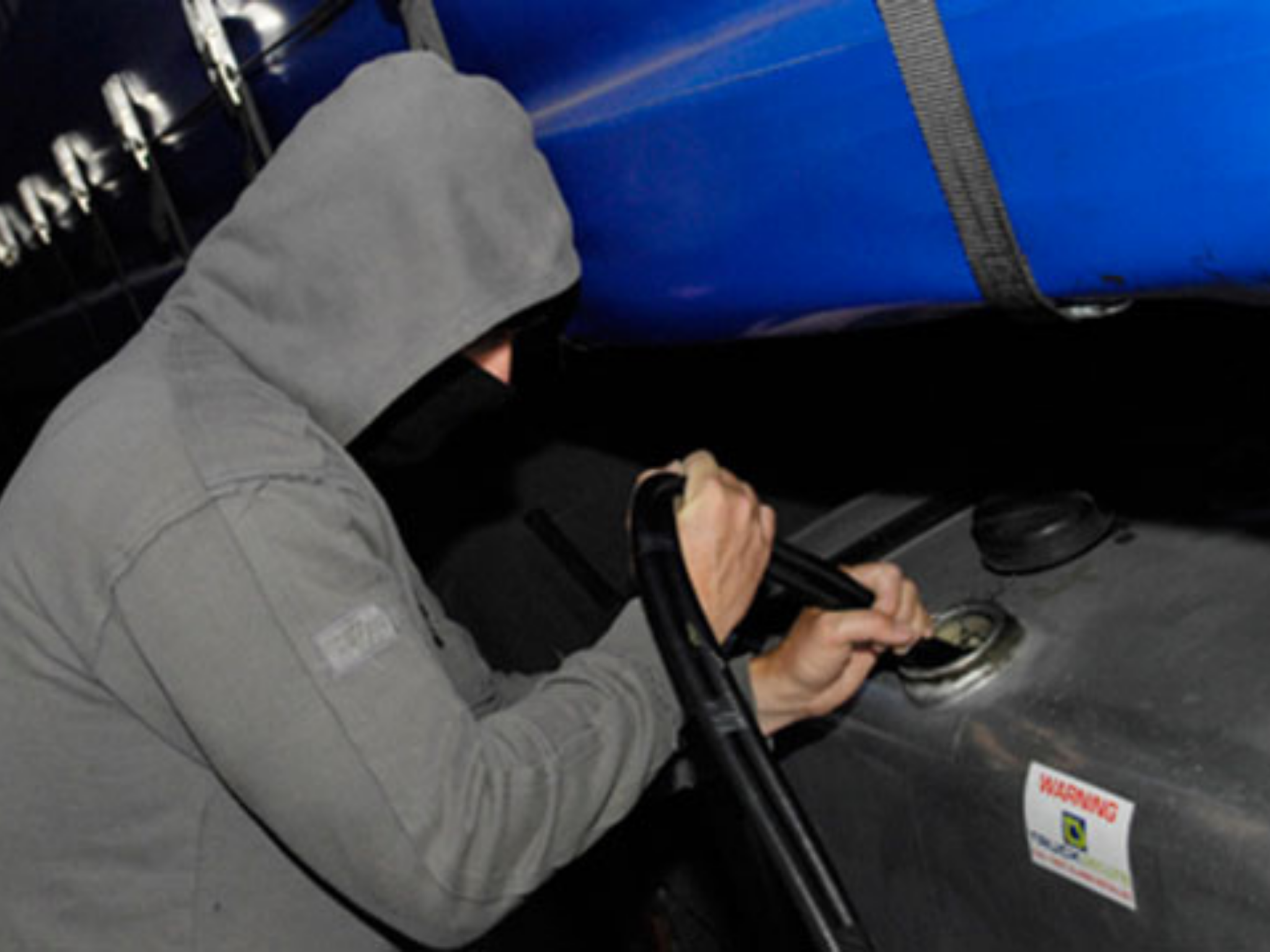 Man Stealing Fuel - 10 x Ways To Prevent Fuel Theft Image